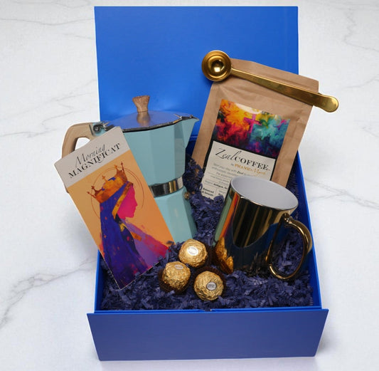 Gift box for coffee lovers with coffee beans, mug, and chocolates