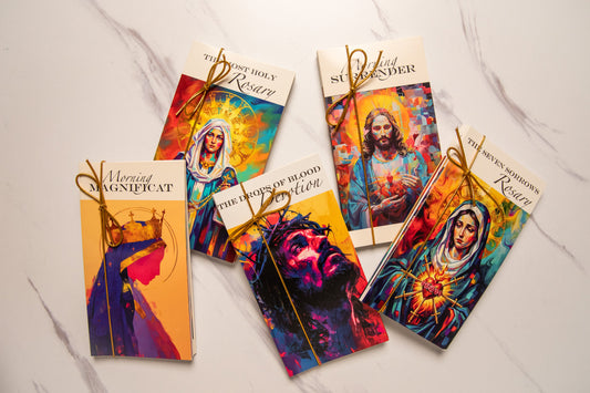 Colorful prayer cards with bold religious illustrations 